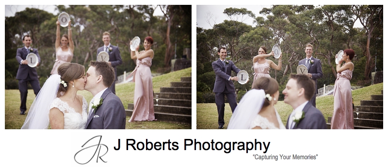 Bride and groom with L-O-V-E signs - sydney wedding photography 